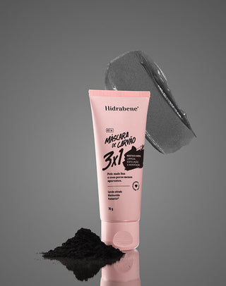Máscara de Carvão 3x1 Hidrabene com pó de carvão ativado e a textura cinza do produto em fundo cinza